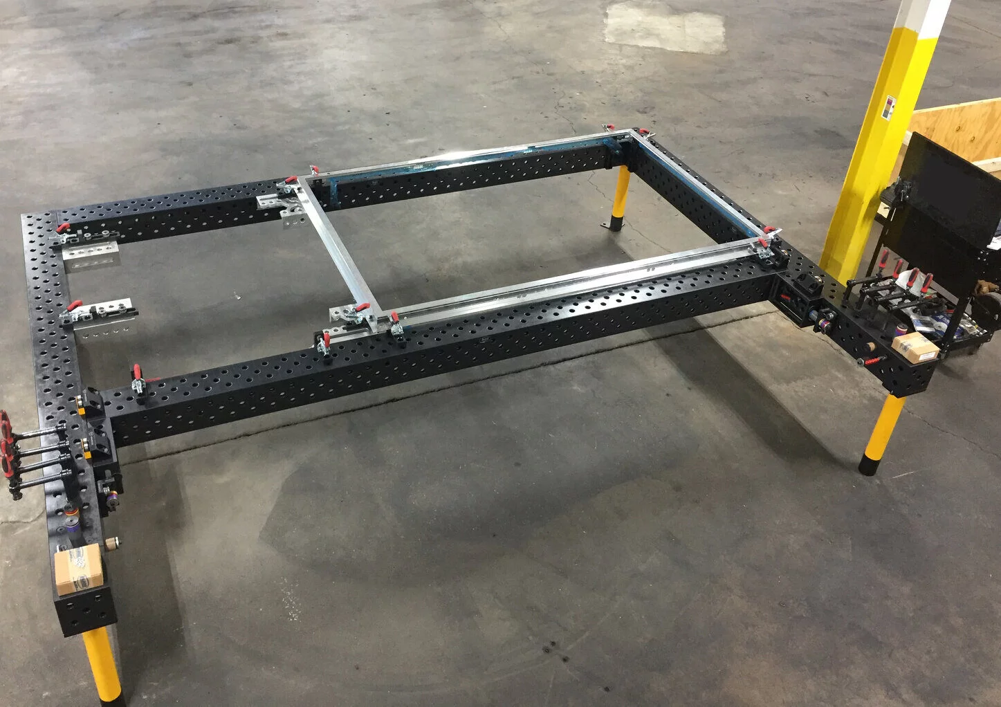 Bluco Modular Fixture holding a window, door frame for precise welding